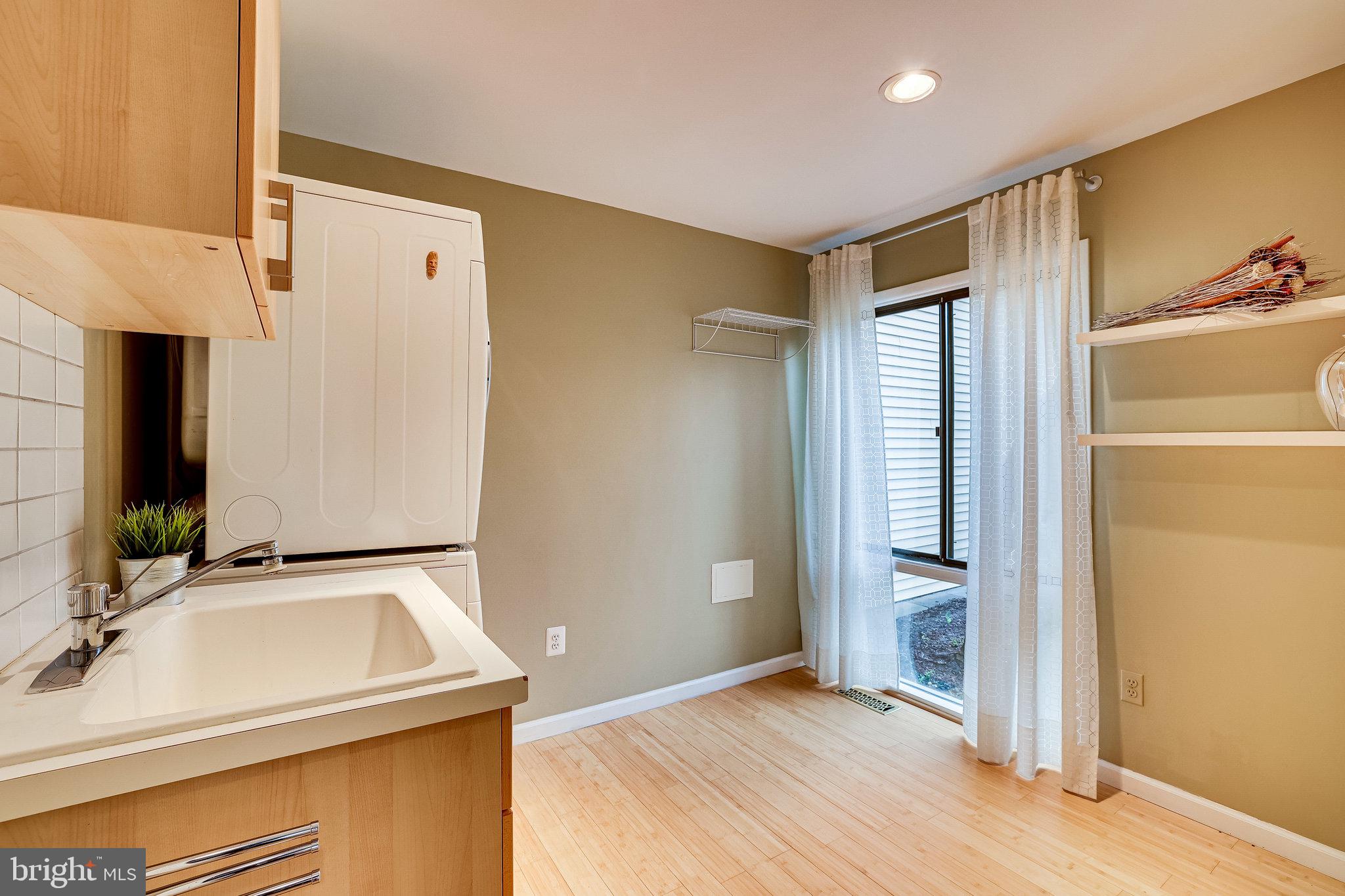 2517 Freetown Drive Reston, VA 20191 - Photo 11 of 71 Spacious laundry room off of the foyer