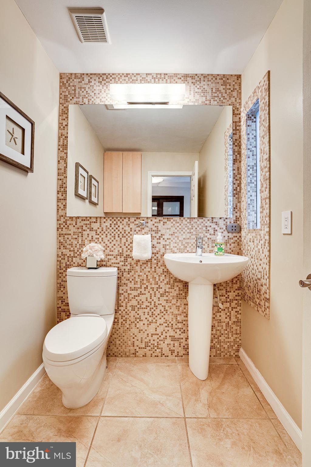 2517 Freetown Drive Reston, VA 20191 - Photo 14 of 71 Half bath on main level with window