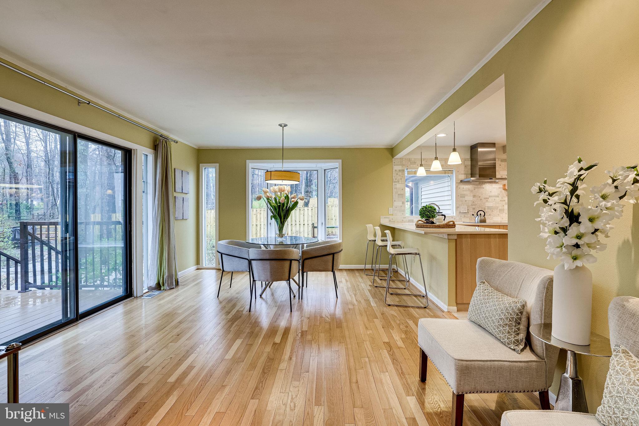 2517 Freetown Drive Reston, VA 20191 - Photo 15 of 71 Dining/Kitchen with sliding doors to deck