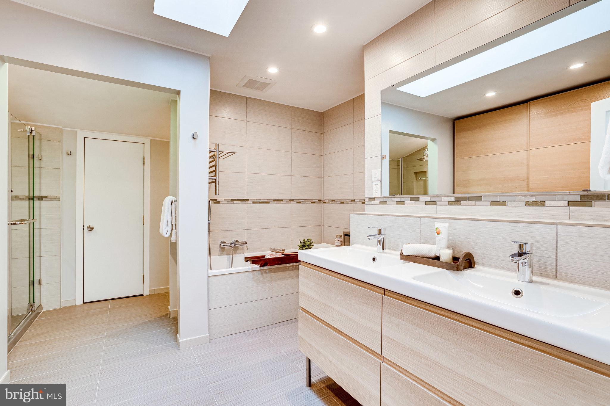 2517 Freetown Drive Reston, VA 20191 - Photo 40 of 71 Spacious primary bathrooms with upgrades galore