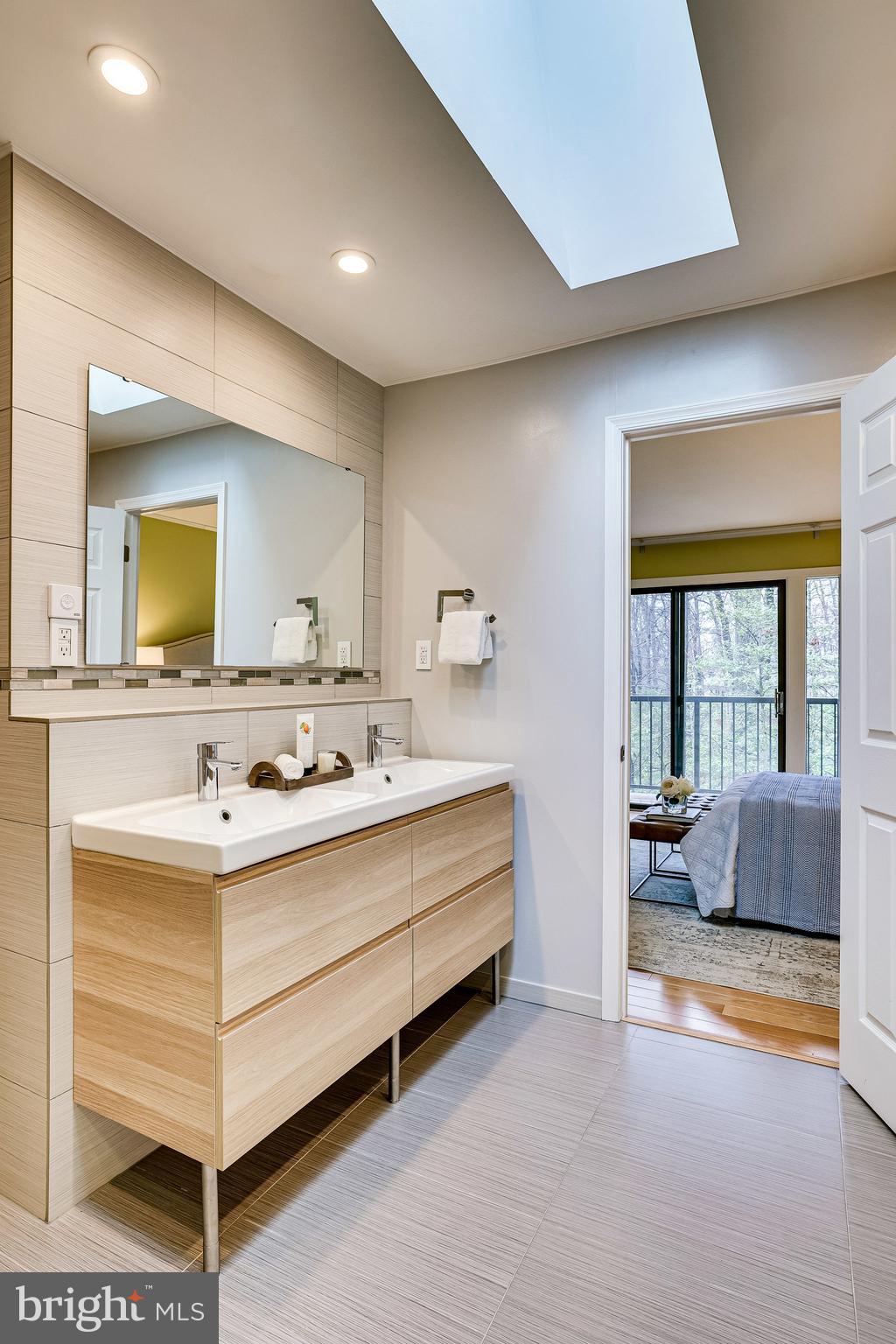 2517 Freetown Drive Reston, VA 20191 - Photo 41 of 71 Skylight with remote control motorized shade