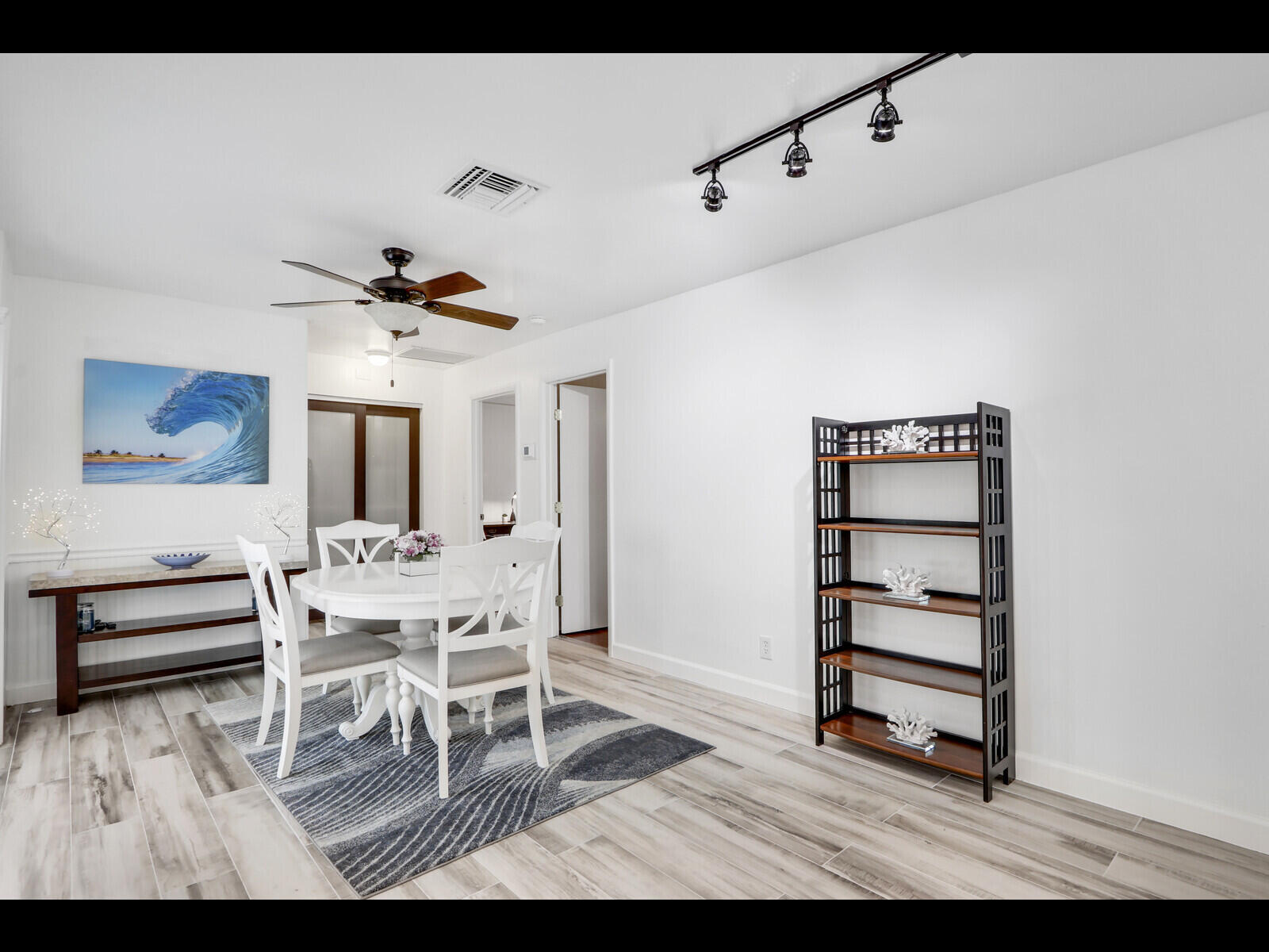 609 Oak Terrace Jupiter, FL 33458 - Photo 14 of 28 a view of a dining room with furniture and window
