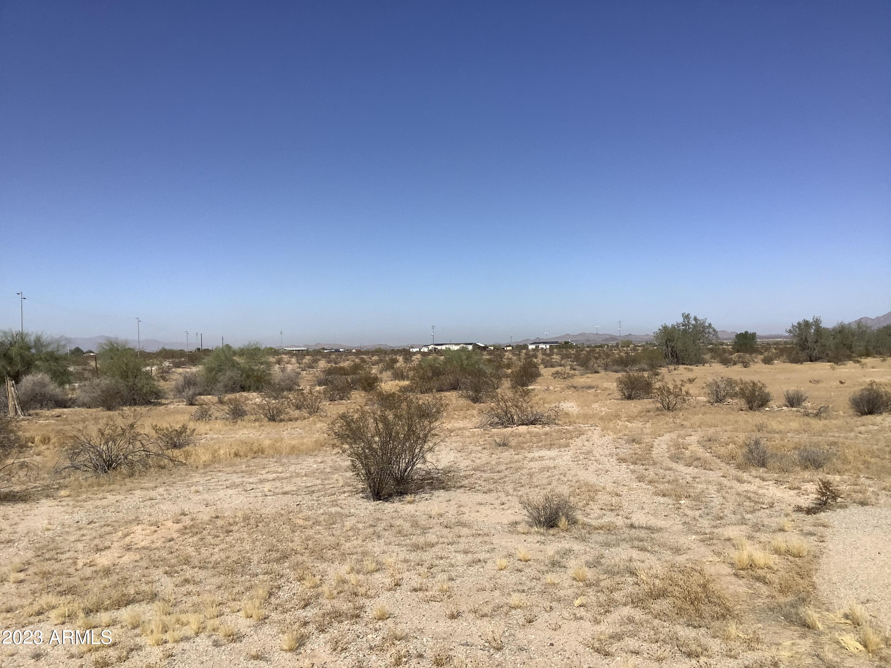 5 Horizon Ranch, Unit 5 Buckeye, AZ 85326 - Photo 3 of 7 a view of a sky from a yard