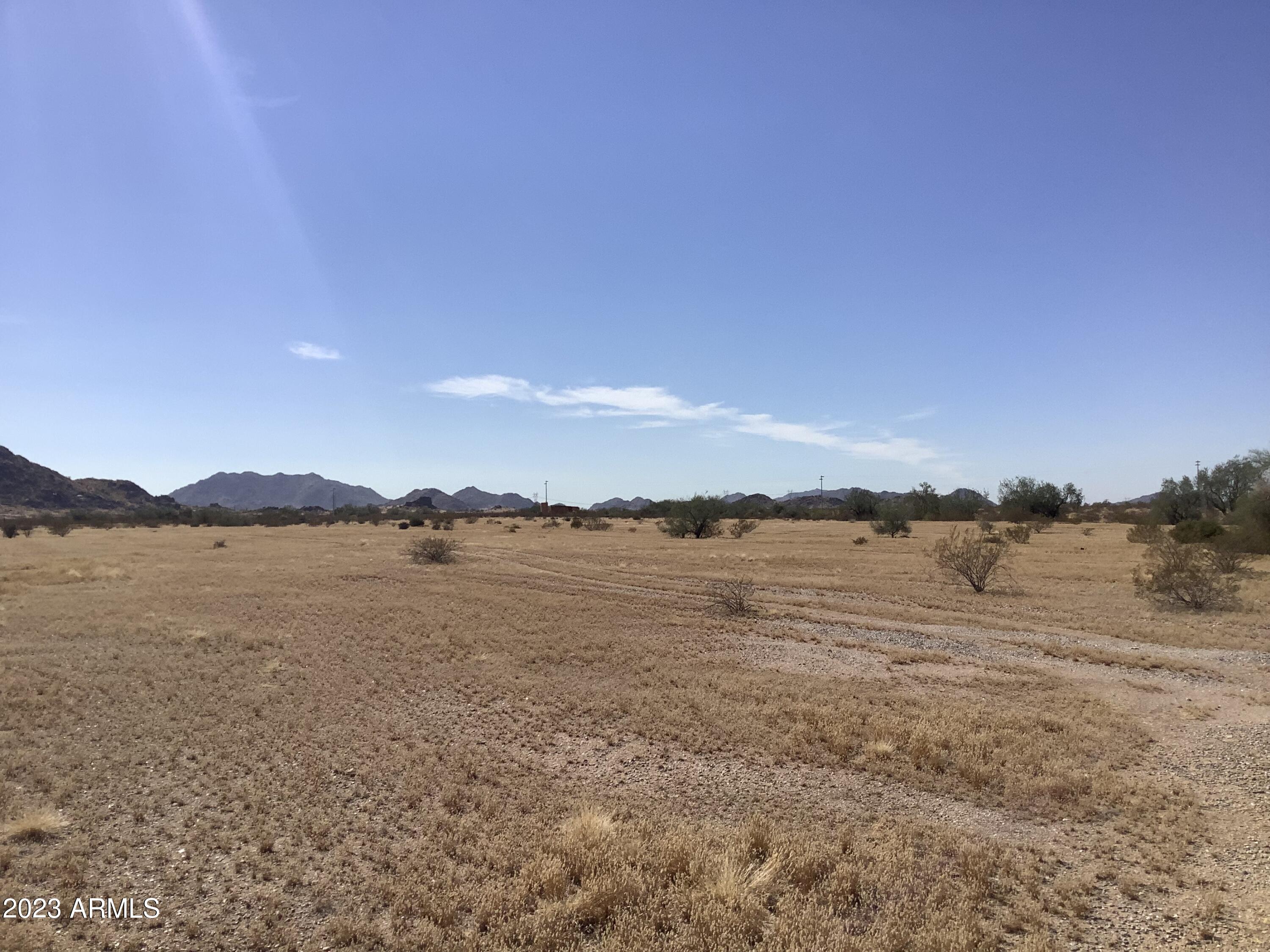 5 Horizon Ranch, Unit 5 Buckeye, AZ 85326 - Photo 7 of 7 a view of lake with mountain in the background