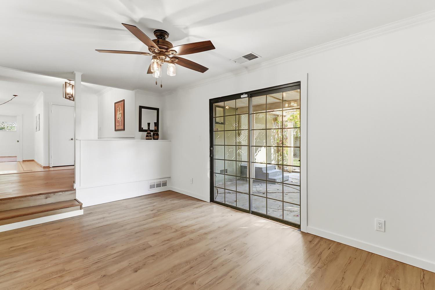 1224 Spruce Lane Davis, CA 95616 - Photo 18 of 49 wooden floor in an empty room with a window