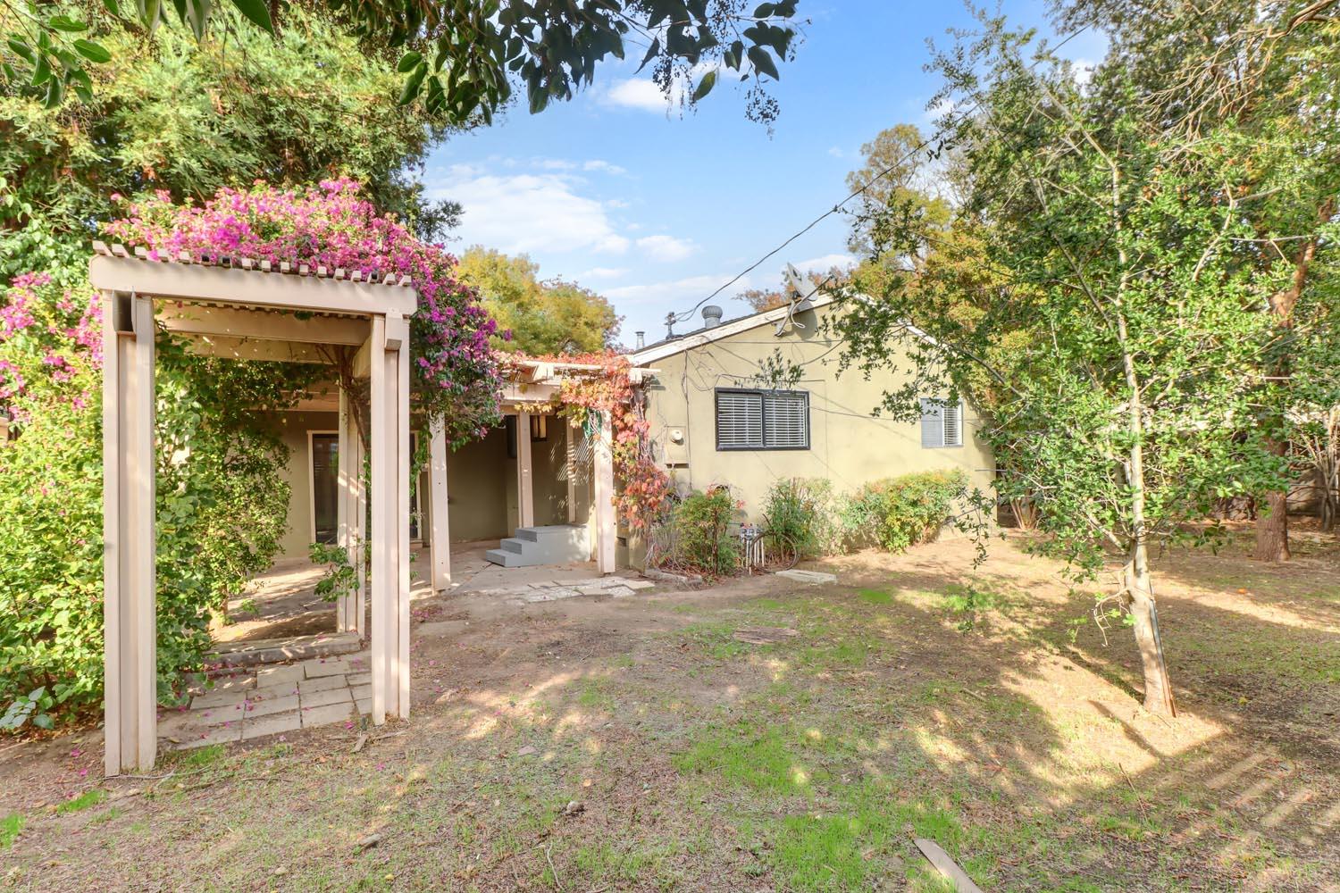 1224 Spruce Lane Davis, CA 95616 - Photo 41 of 49 a front view of a house with a porch