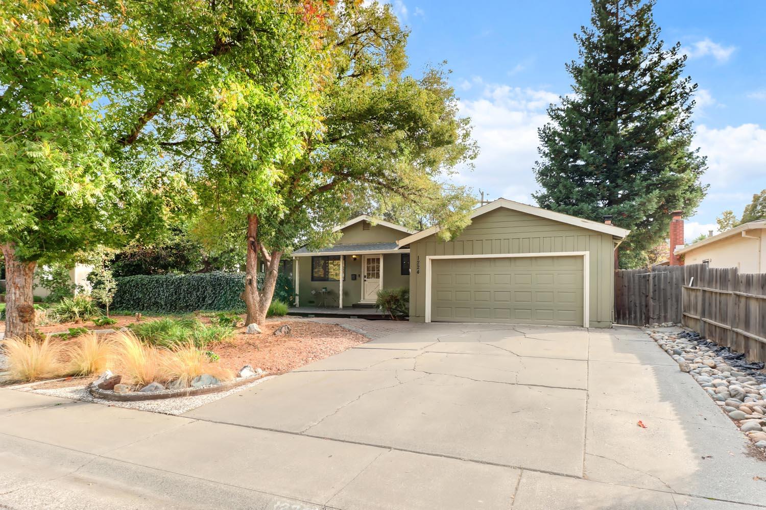 1224 Spruce Lane Davis, CA 95616 - Photo 47 of 49 a front view of house with yard and trees around