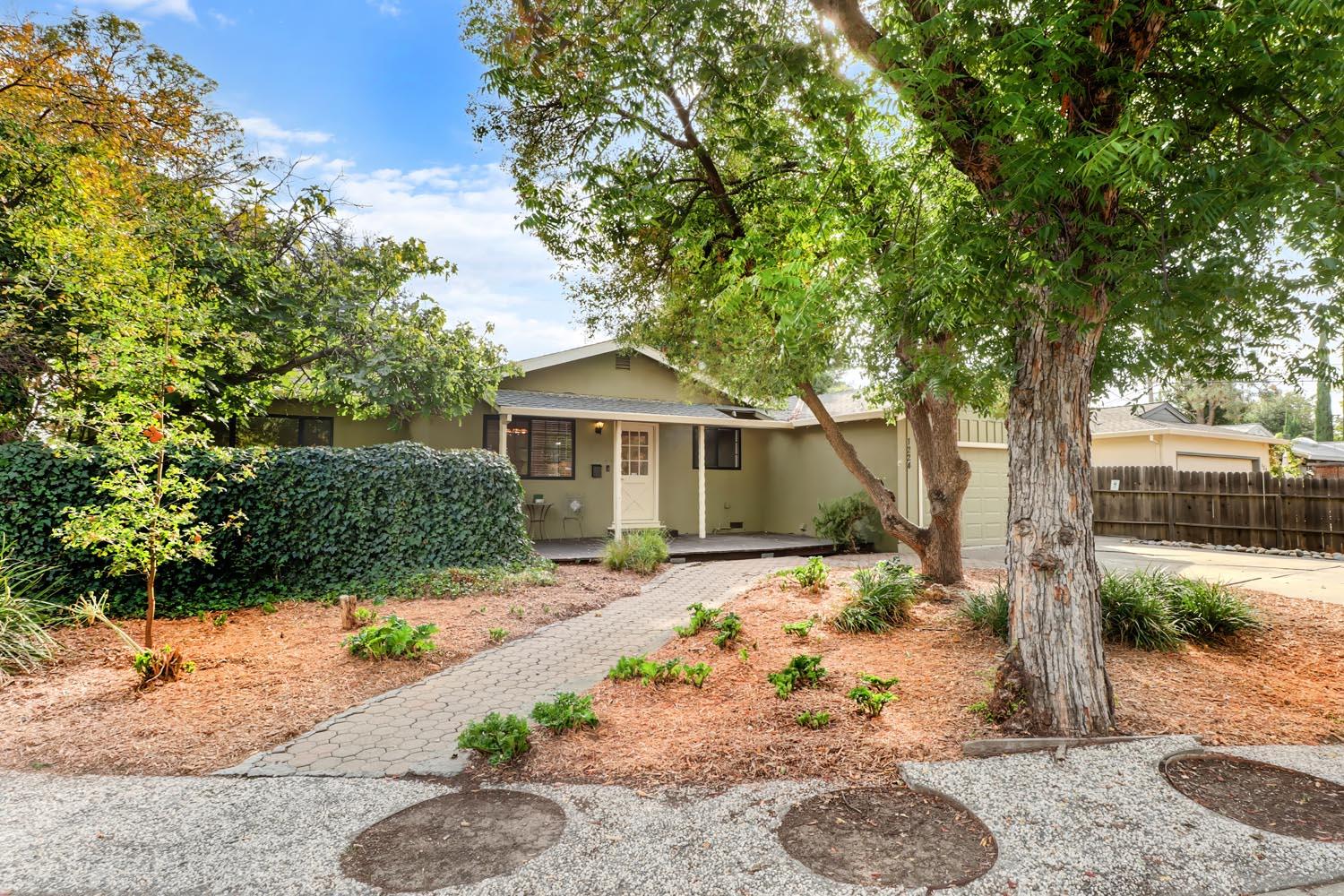 1224 Spruce Lane Davis, CA 95616 - Photo 48 of 49 a front view of a house with a yard