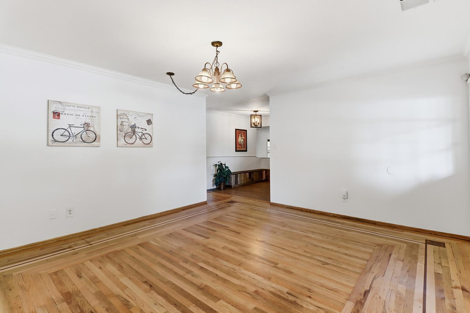 1224 Spruce Lane Davis, CA 95616 - Photo 8 of 49 wooden floor in an empty room with a window