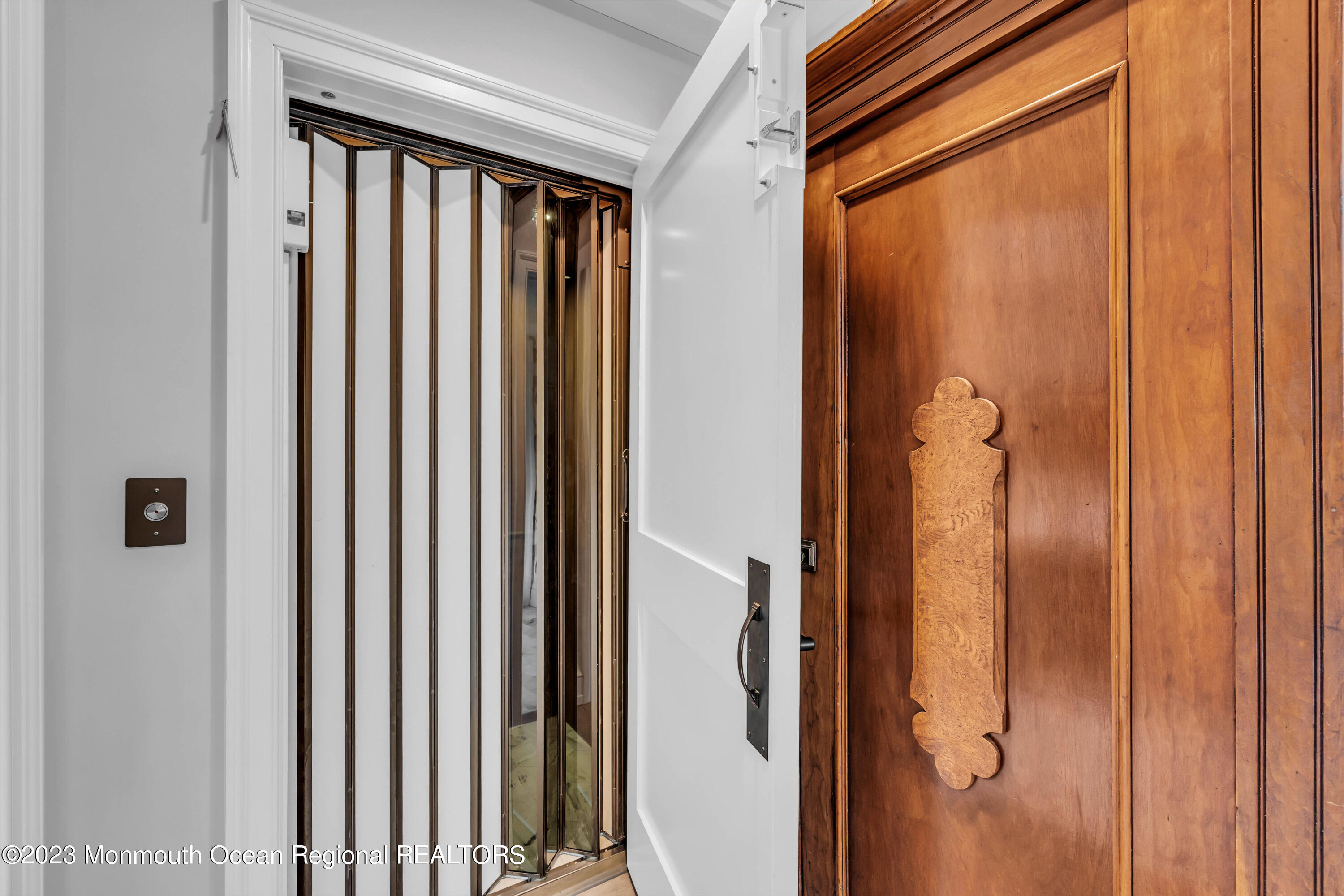 308 Jersey Avenue Spring Lake, NJ 07762 - Photo 46 of 100 308 Jersey elevator with gate