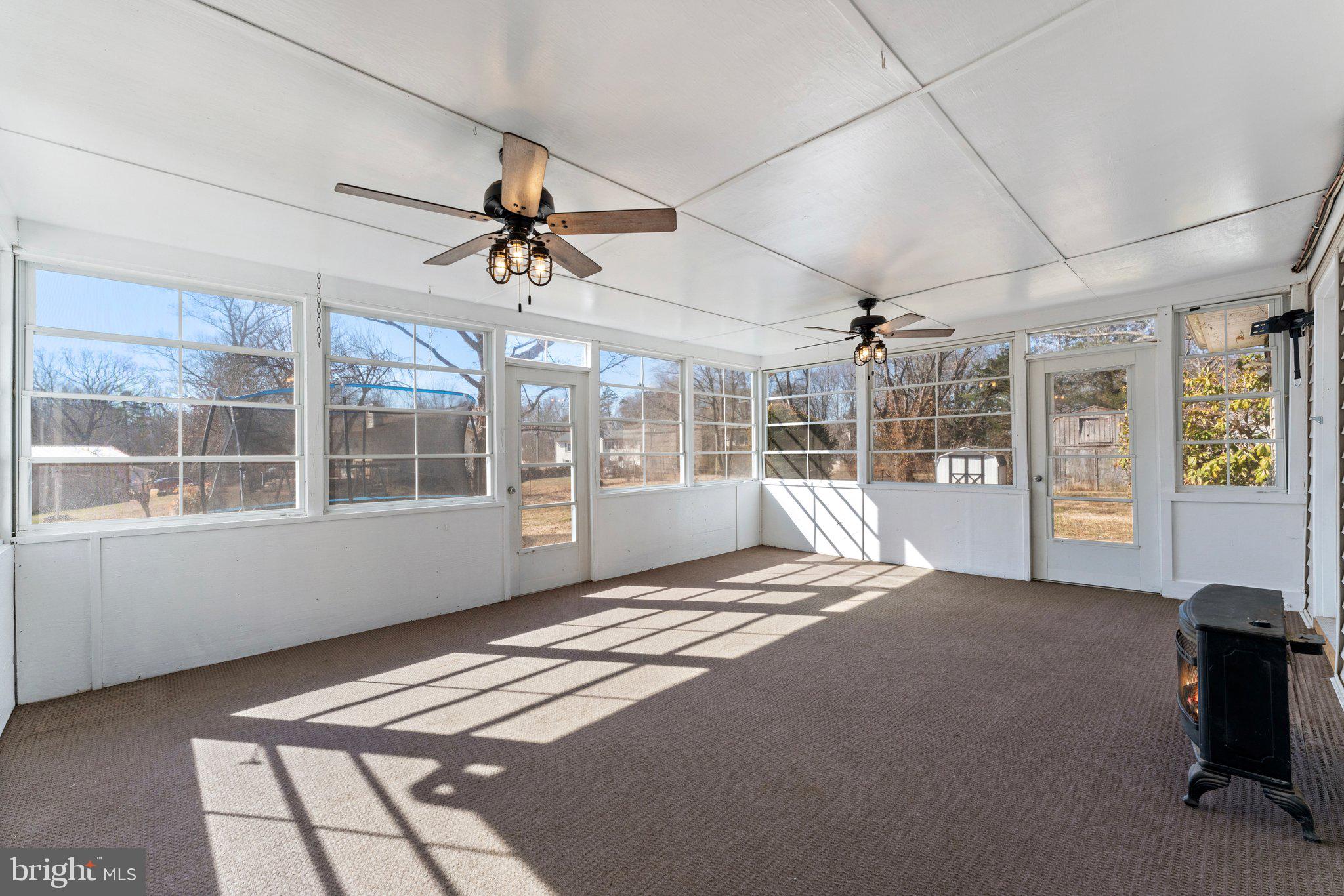 15307 Thoroughfare Road Gainesville, VA 20155 - Photo 16 of 38 a large bedroom with a bed and wooden floor