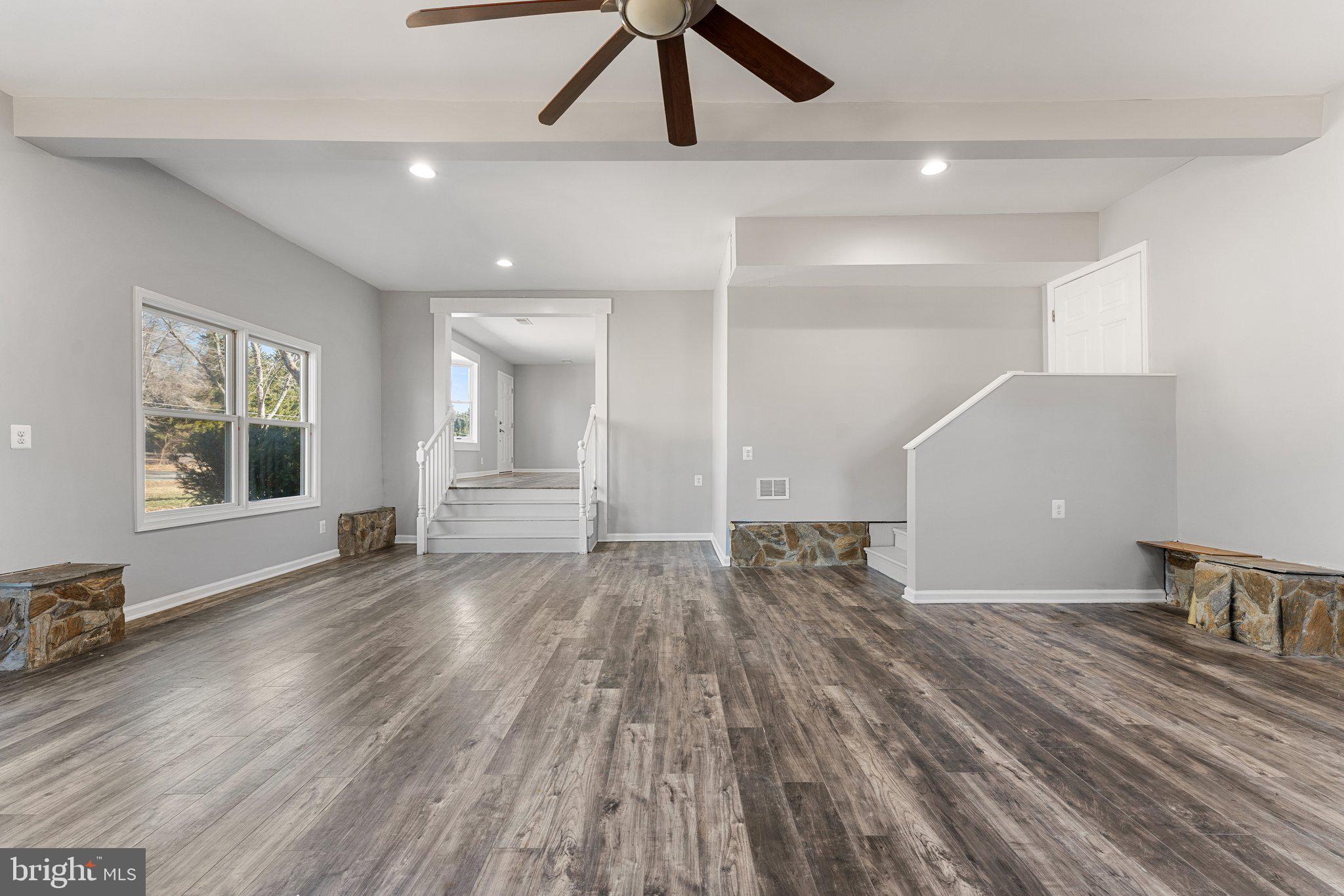 15307 Thoroughfare Road Gainesville, VA 20155 - Photo 32 of 38 a view of empty room with wooden floor and fan