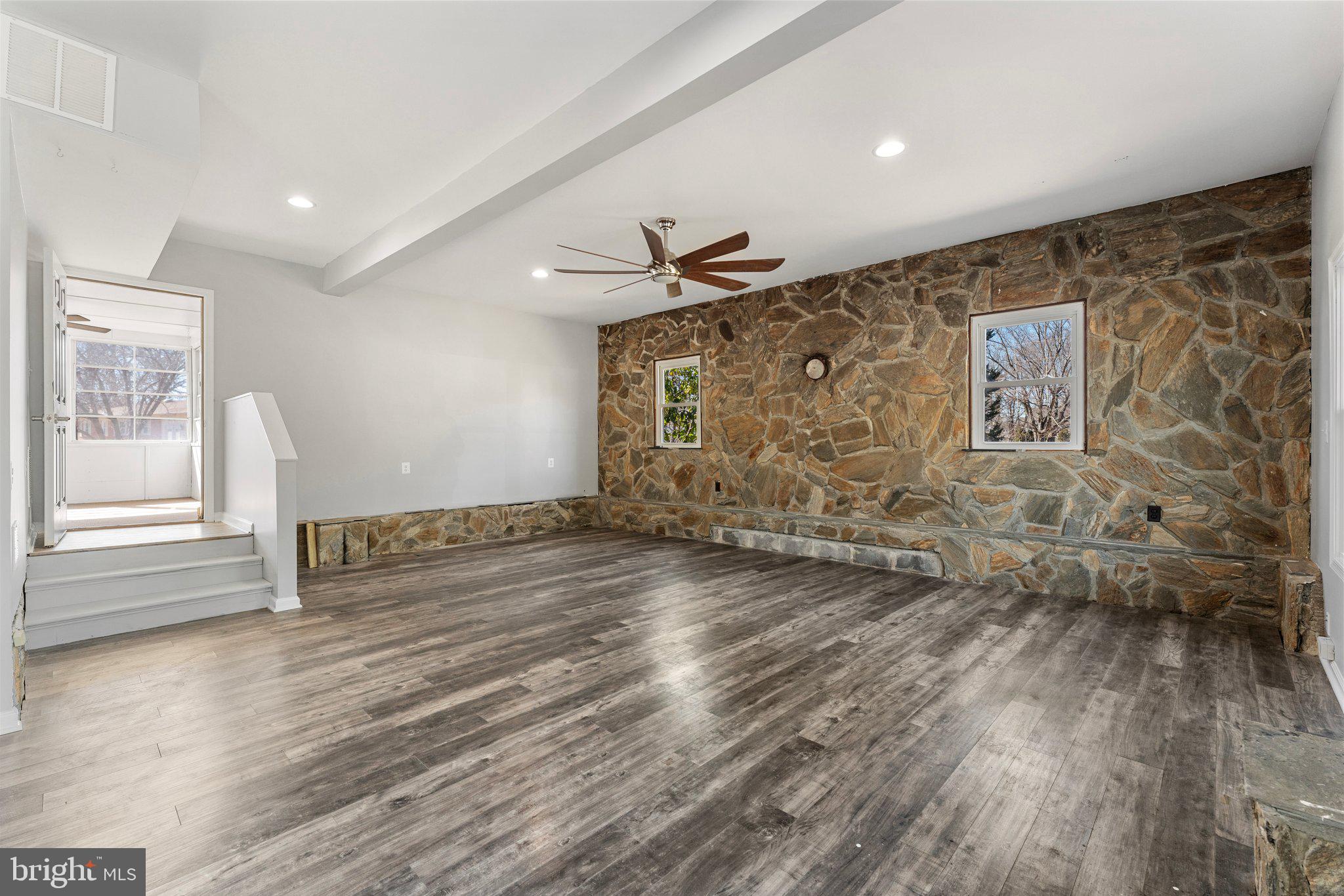 15307 Thoroughfare Road Gainesville, VA 20155 - Photo 33 of 38 wooden floor in an empty room with a window