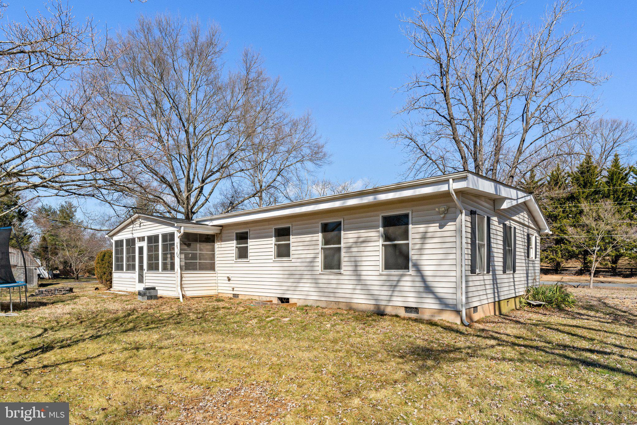15307 Thoroughfare Road Gainesville, VA 20155 - Photo 37 of 38 a front view of a house with a yard