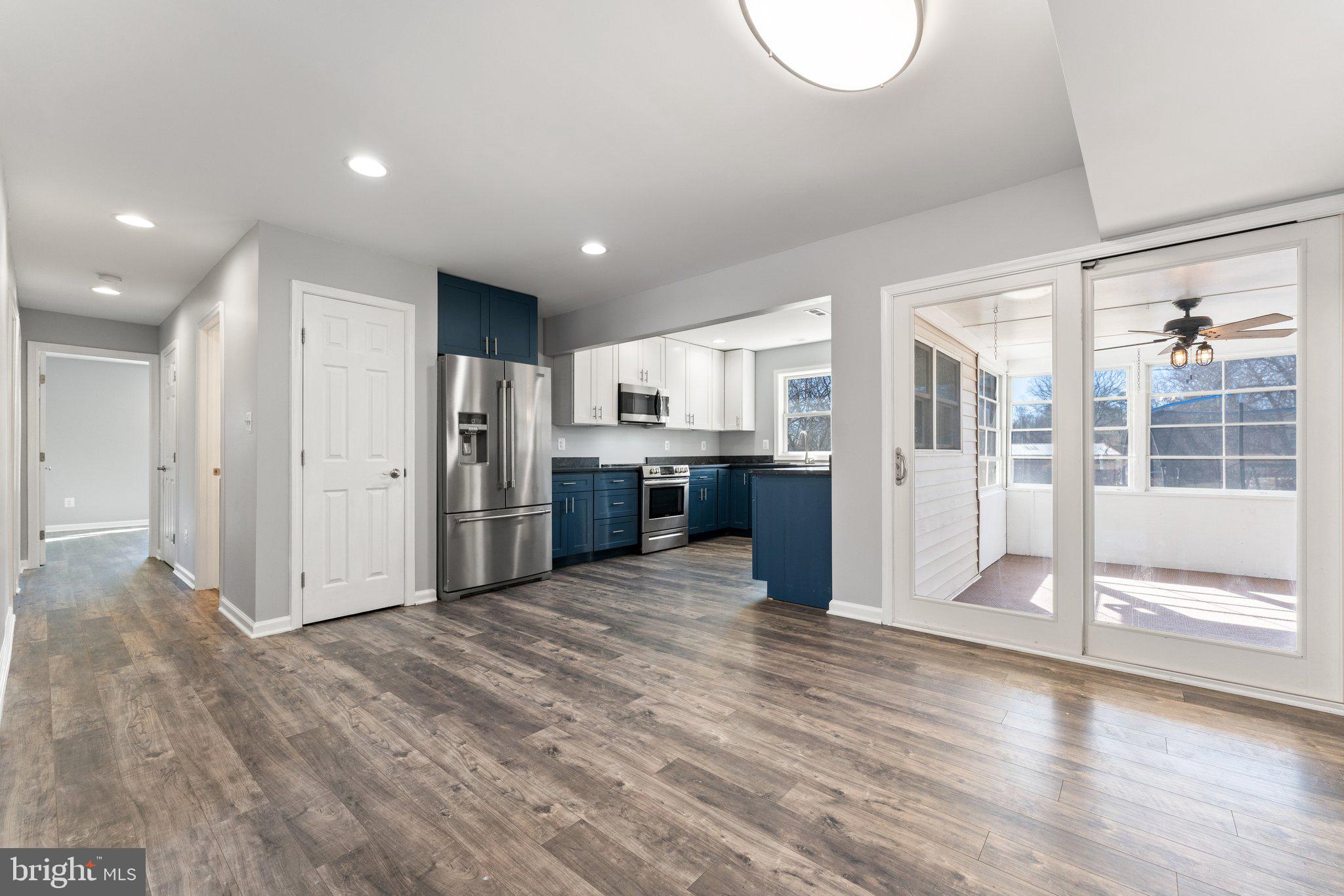 15307 Thoroughfare Road Gainesville, VA 20155 - Photo 6 of 38 a view of a kitchen with a sink and a kitchen