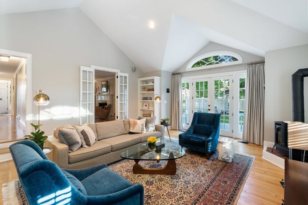4 Chesterton Road Wellesley, MA 02481 - Photo 11 of 29 a living room with furniture and a large window