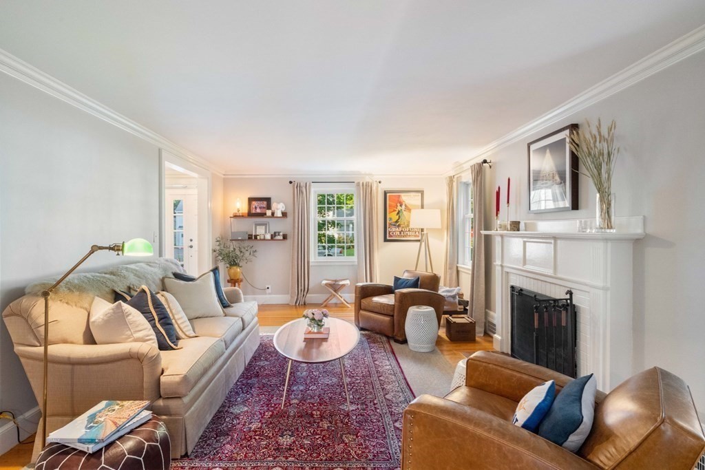 4 Chesterton Road Wellesley, MA 02481 - Photo 7 of 29 a living room with furniture fireplace and a window