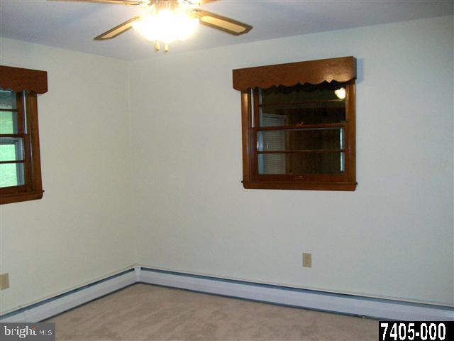 1228 Glatco Lodge Road Hanover, PA 17331 - Photo 8 of 13 an empty room with a window