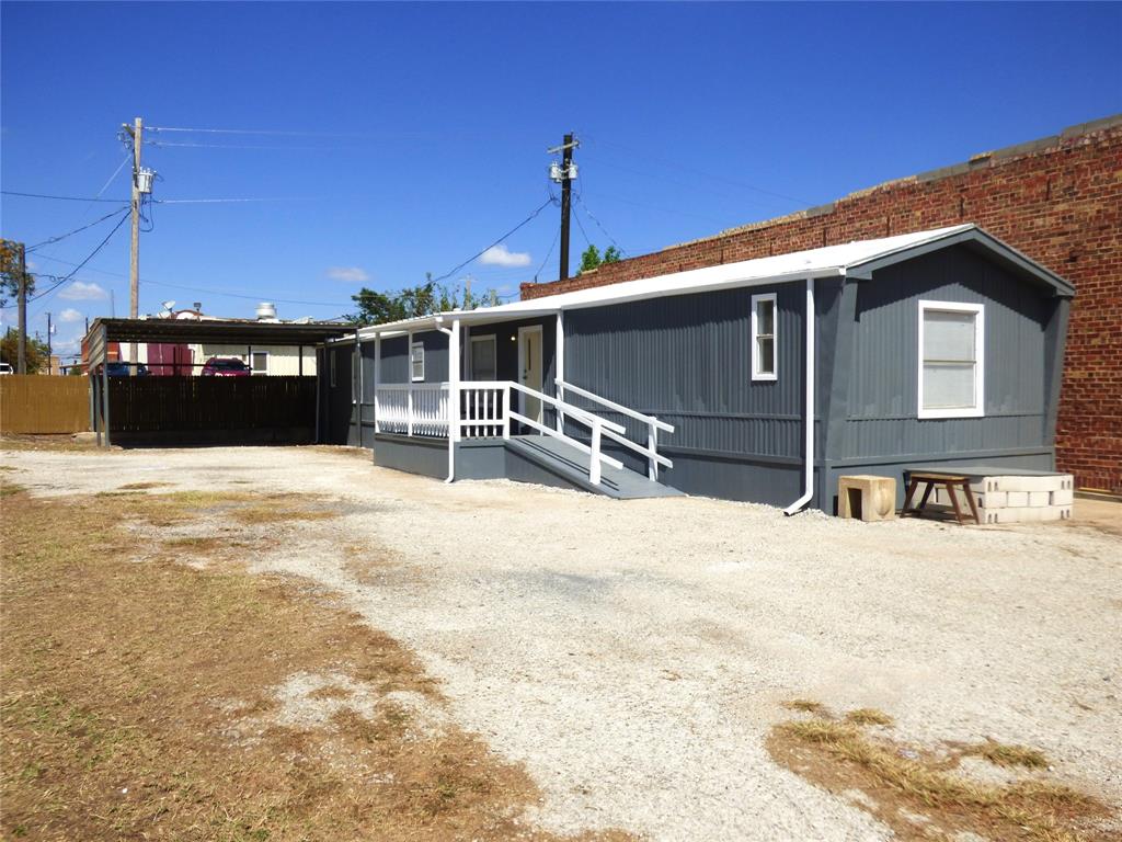 105 East 9th Street Cisco, TX 76437 - Photo 1 of 33 a house view with a outdoor space