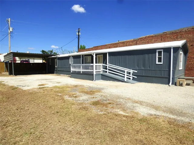 a view of a house with a patio