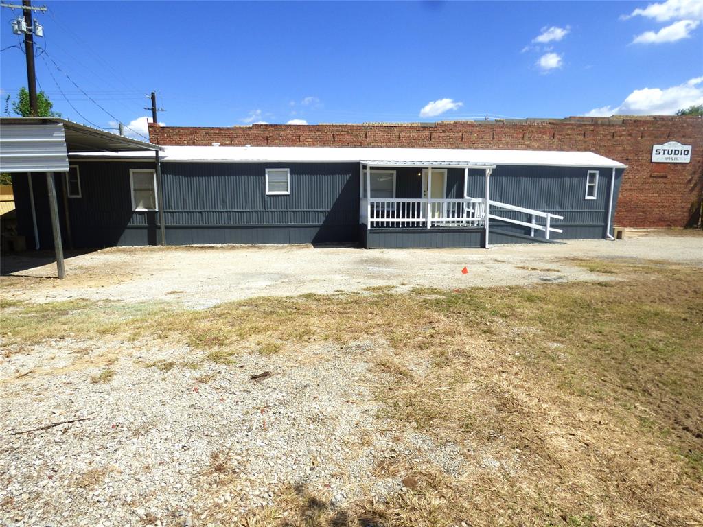 105 East 9th Street Cisco, TX 76437 - Photo 3 of 33 a view of an house with backyard space and balcony