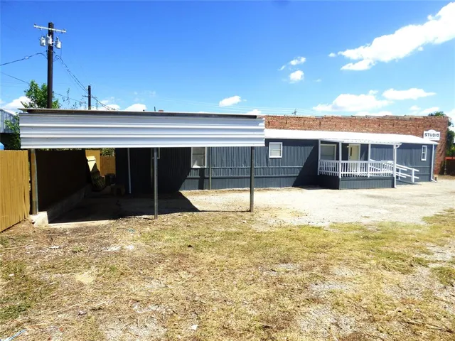 a view of a swimming pool with an outdoor space