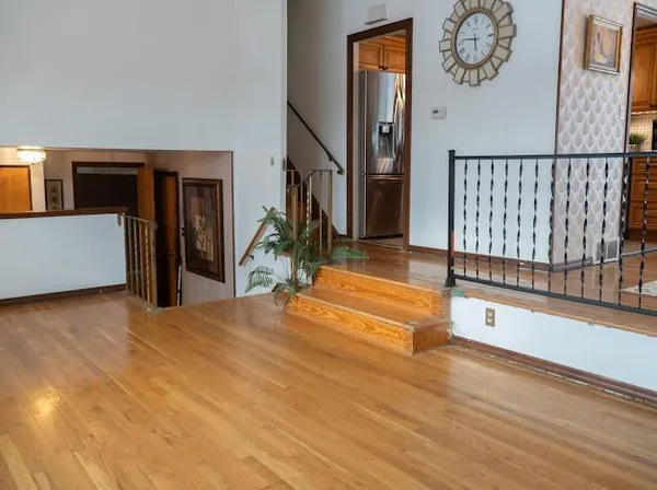 a view of a hallway with windows