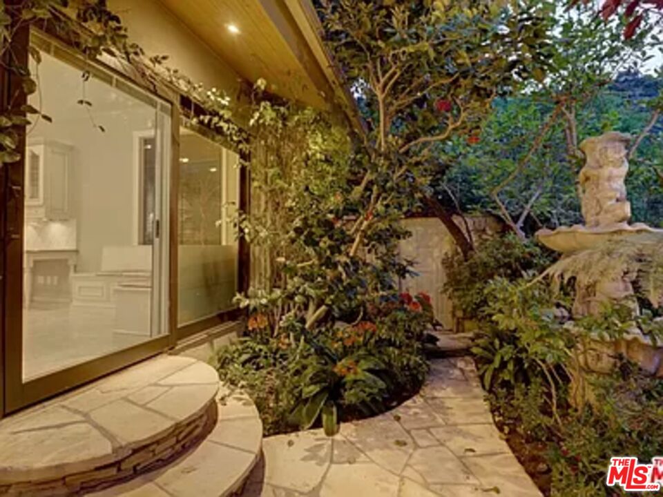 1681 Stone Canyon Road Los Angeles, CA 90077 - Photo 31 of 41 a view of a entryway door of the house