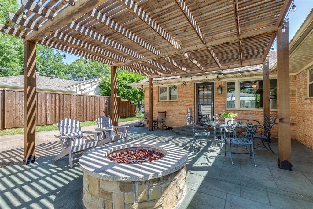 7328 Rockhurst Drive Dallas, TX 75214 - Photo 21 of 22 a view of an outdoor space with seating area