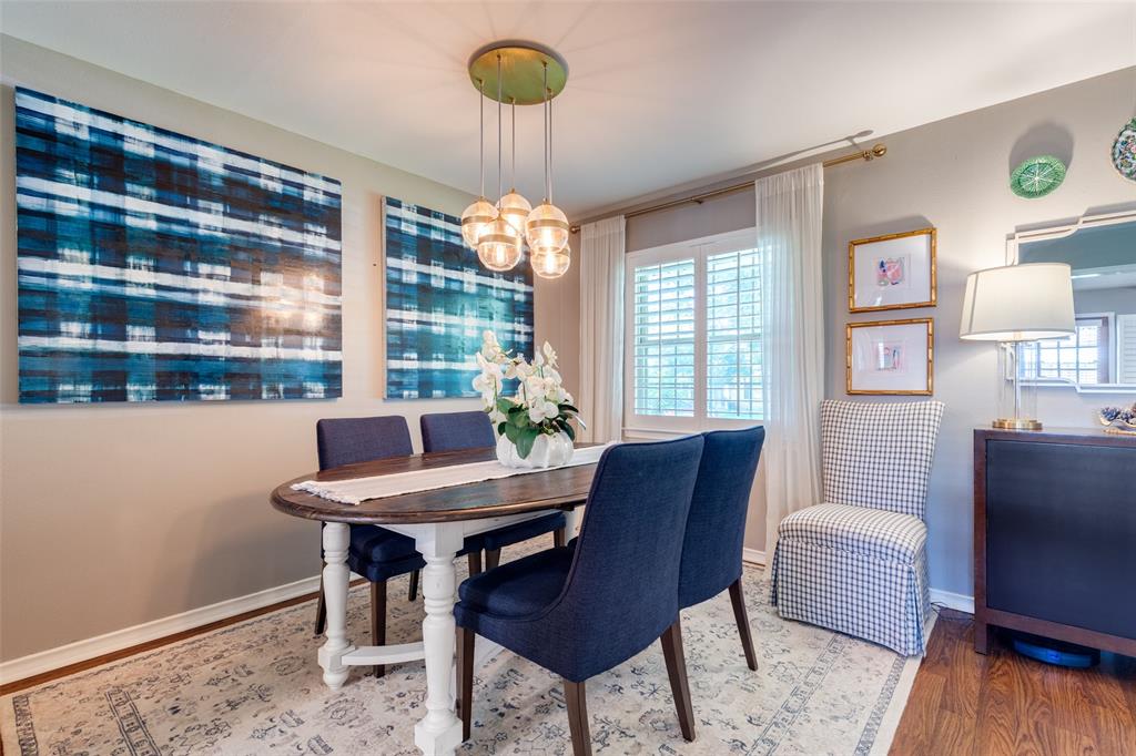 7328 Rockhurst Drive Dallas, TX 75214 - Photo 8 of 22 a view of a dining room with furniture window and outside view