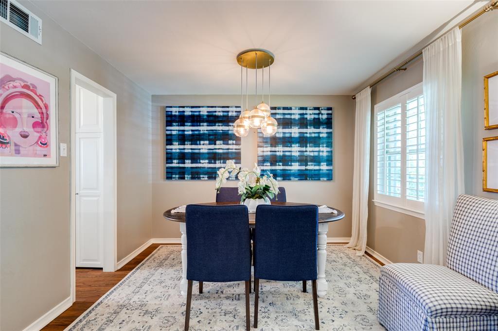7328 Rockhurst Drive Dallas, TX 75214 - Photo 9 of 22 a view of a dining room with furniture window and outside view