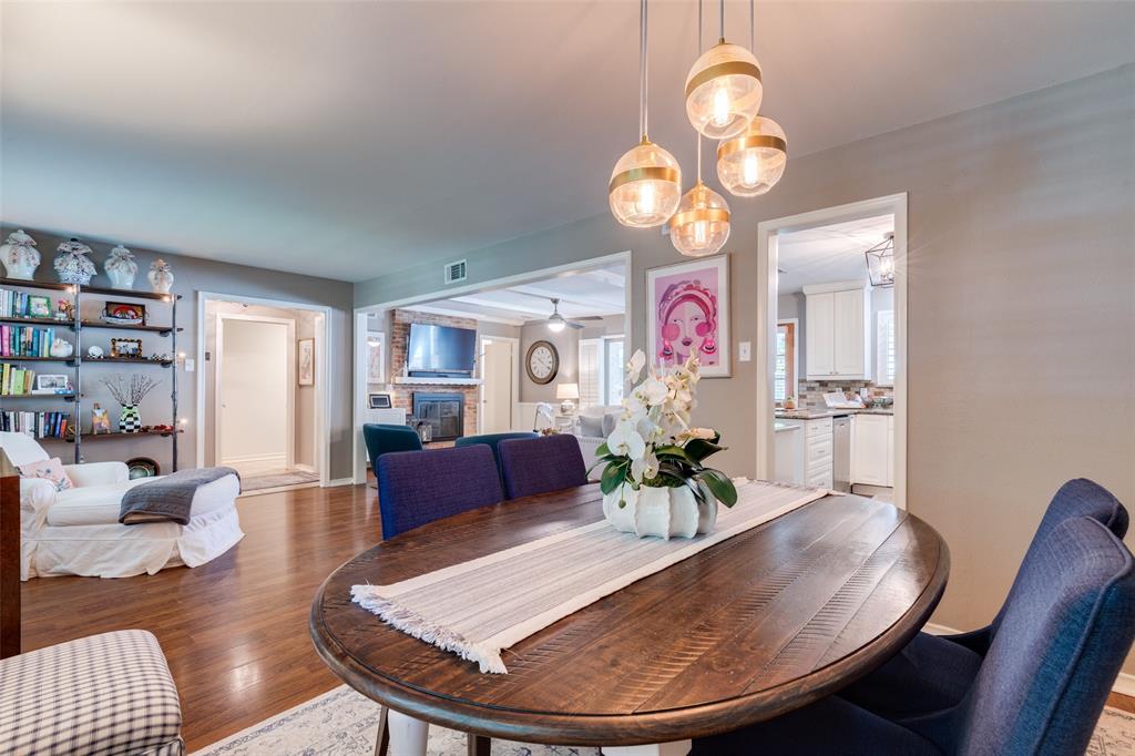 7328 Rockhurst Drive Dallas, TX 75214 - Photo 10 of 22 a view of a dining room with furniture