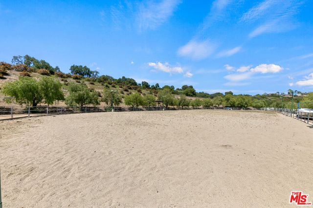 a room with furniture and screen