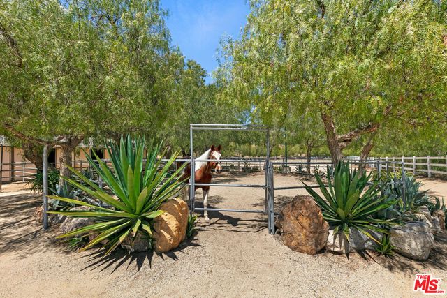 a view of a town with mountains in the background