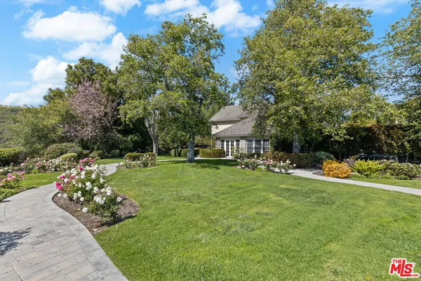 an aerial view of house with yard