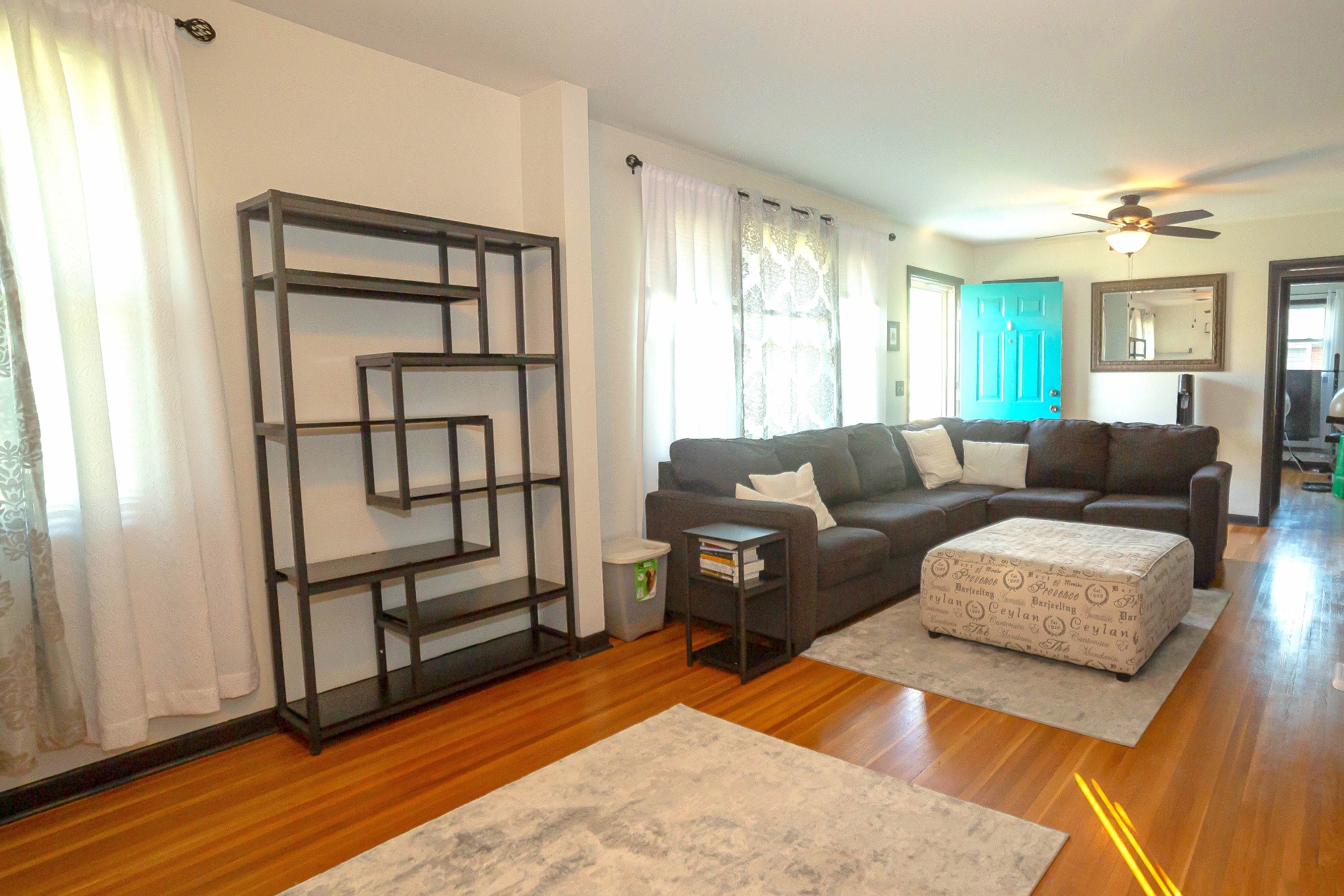 218 Jacksonian Drive Hermitage, TN 37076 - Photo 2 of 15 a living room with furniture wooden floor and a window