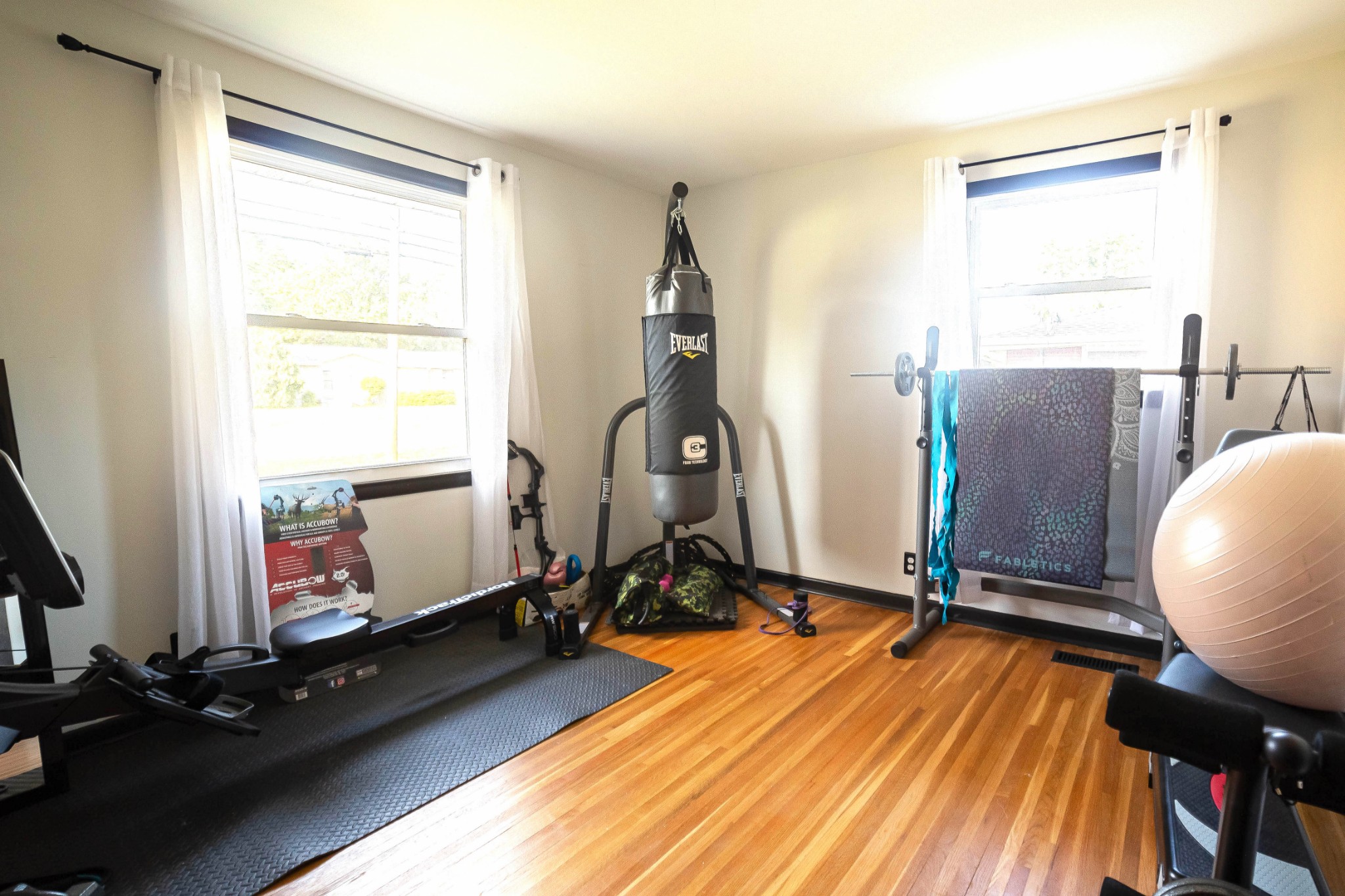 218 Jacksonian Drive Hermitage, TN 37076 - Photo 9 of 15 a room with gym equipment and windows