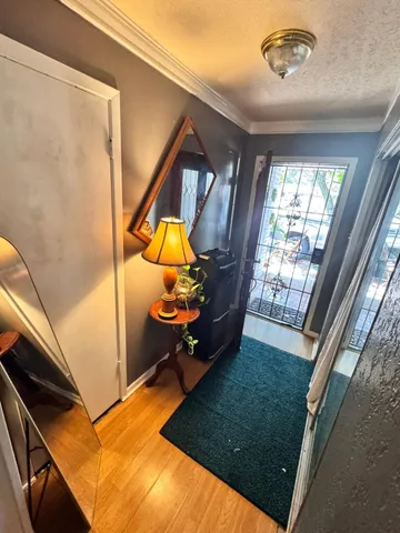 a bathroom with a sink a toilet a shower and a mirror