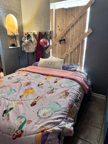 a view of a park with plants and trees