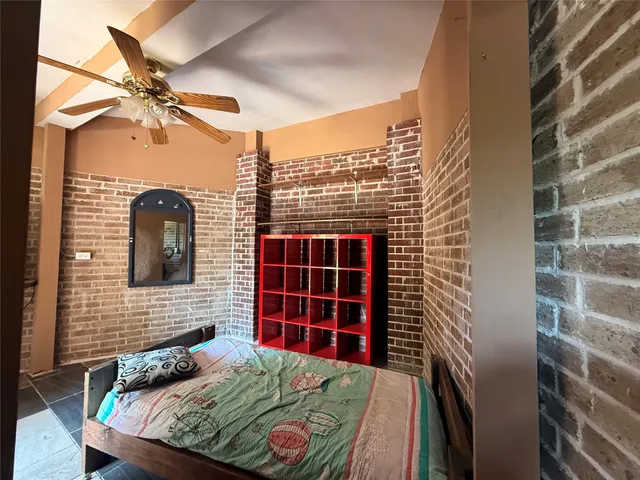 a view of a backyard with sitting area