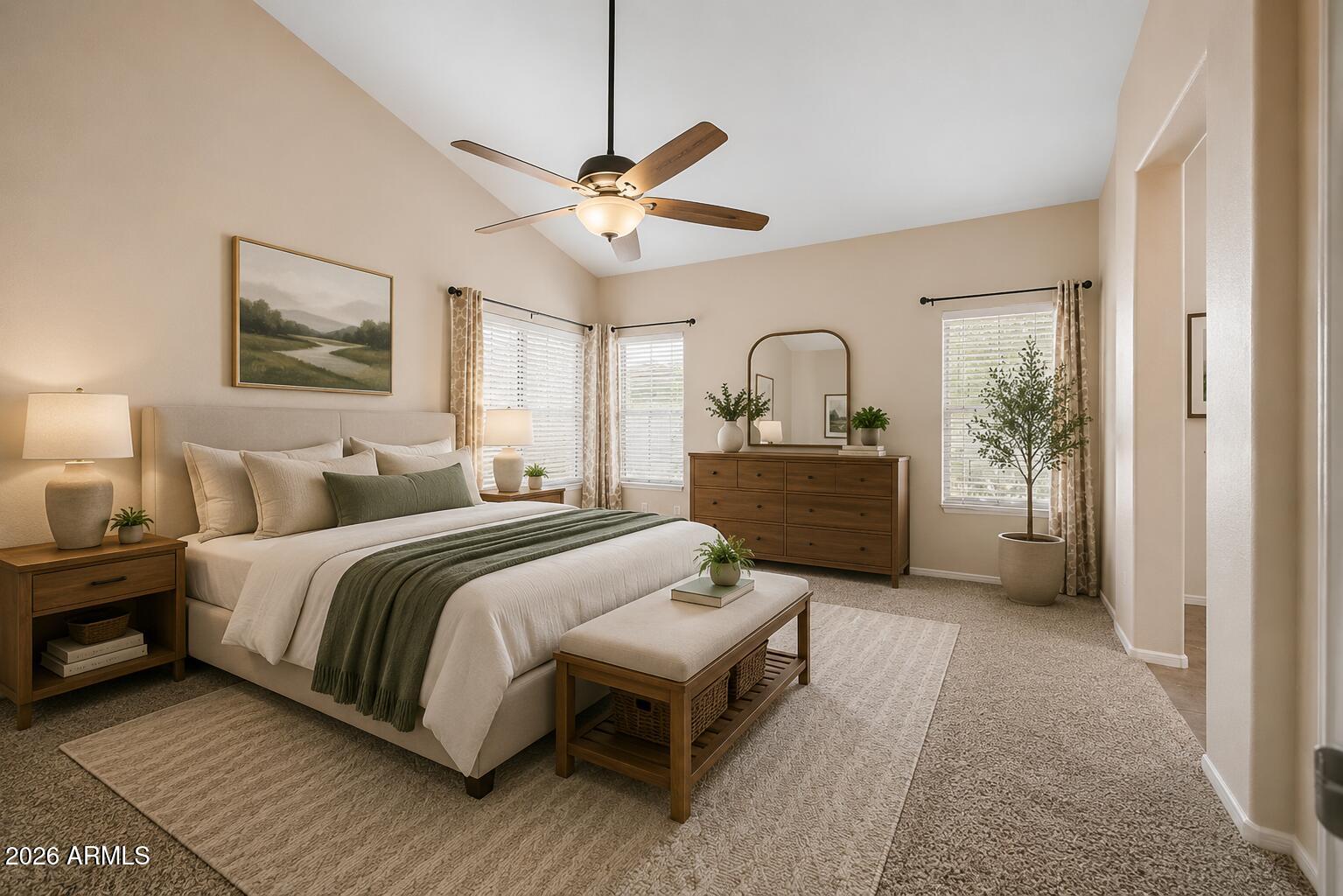 40602 North Apollo Way Anthem, AZ 85086 - Photo 19 of 38 a spacious bedroom with a bed mirror and a window