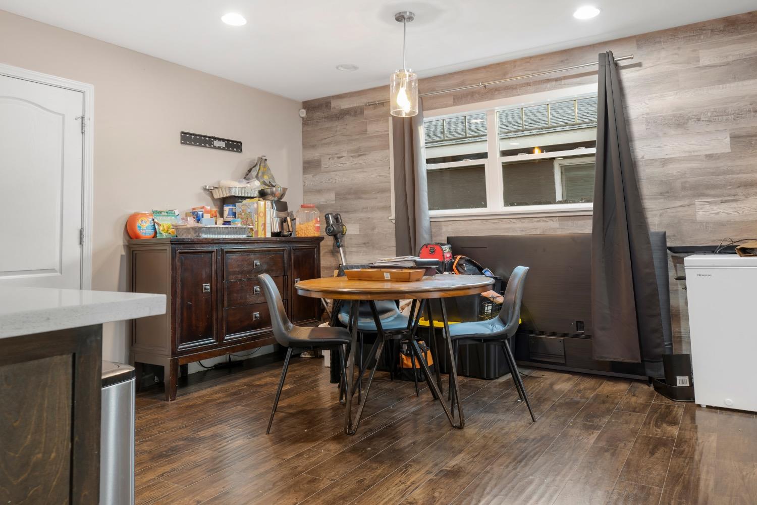 1813 Poppy Lane Ceres, CA 95307 - Photo 14 of 27 a view of a dining room with furniture window and wooden floor