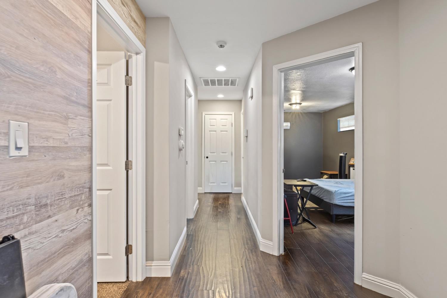1813 Poppy Lane Ceres, CA 95307 - Photo 8 of 27 a view of a hallway with a livingroom and living room