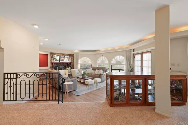 a room with fireplace and chair