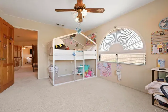 a view of house with outdoor space and seating area