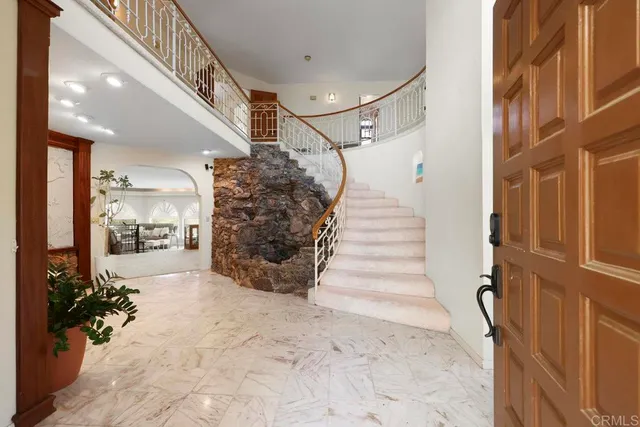 a view of entryway with a front door