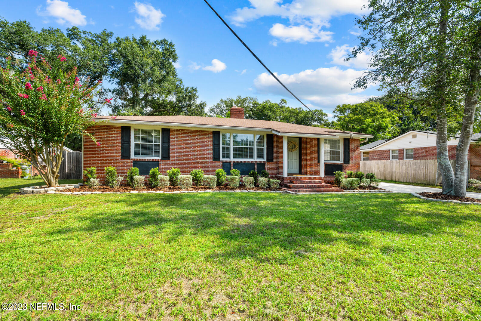 4417 San Jose Boulevard Jacksonville, FL 32207 - Photo 1 of 36 a front view of house with yard and green space