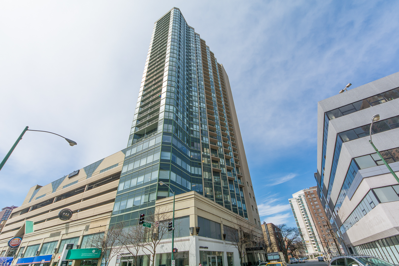 111 West Maple Street, Unit 2406 Chicago, IL 60610 - Photo 1 of 18 a view of a city with tall buildings