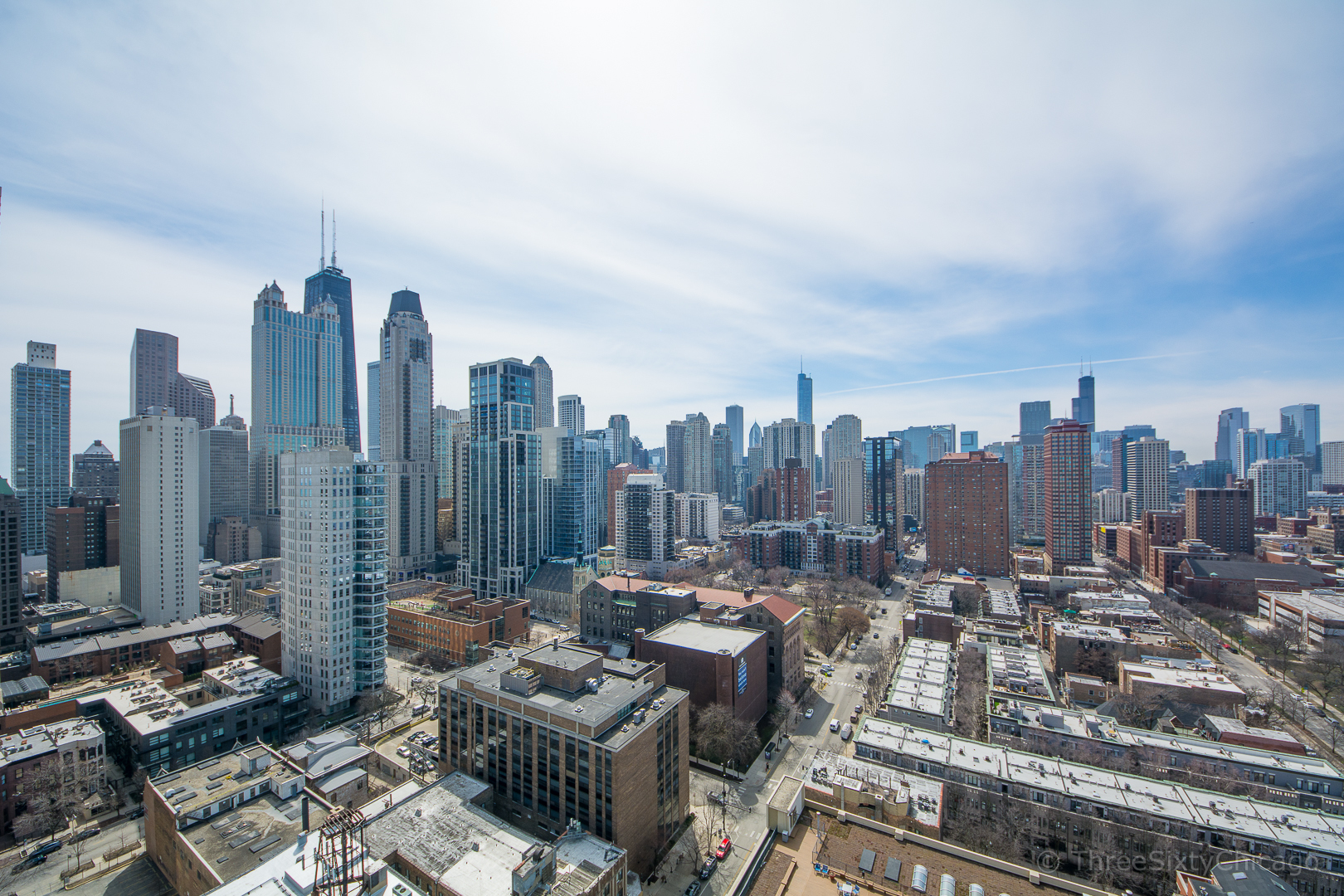 111 West Maple Street, Unit 2406 Chicago, IL 60610 - Photo 15 of 18 a view of a city with tall buildings