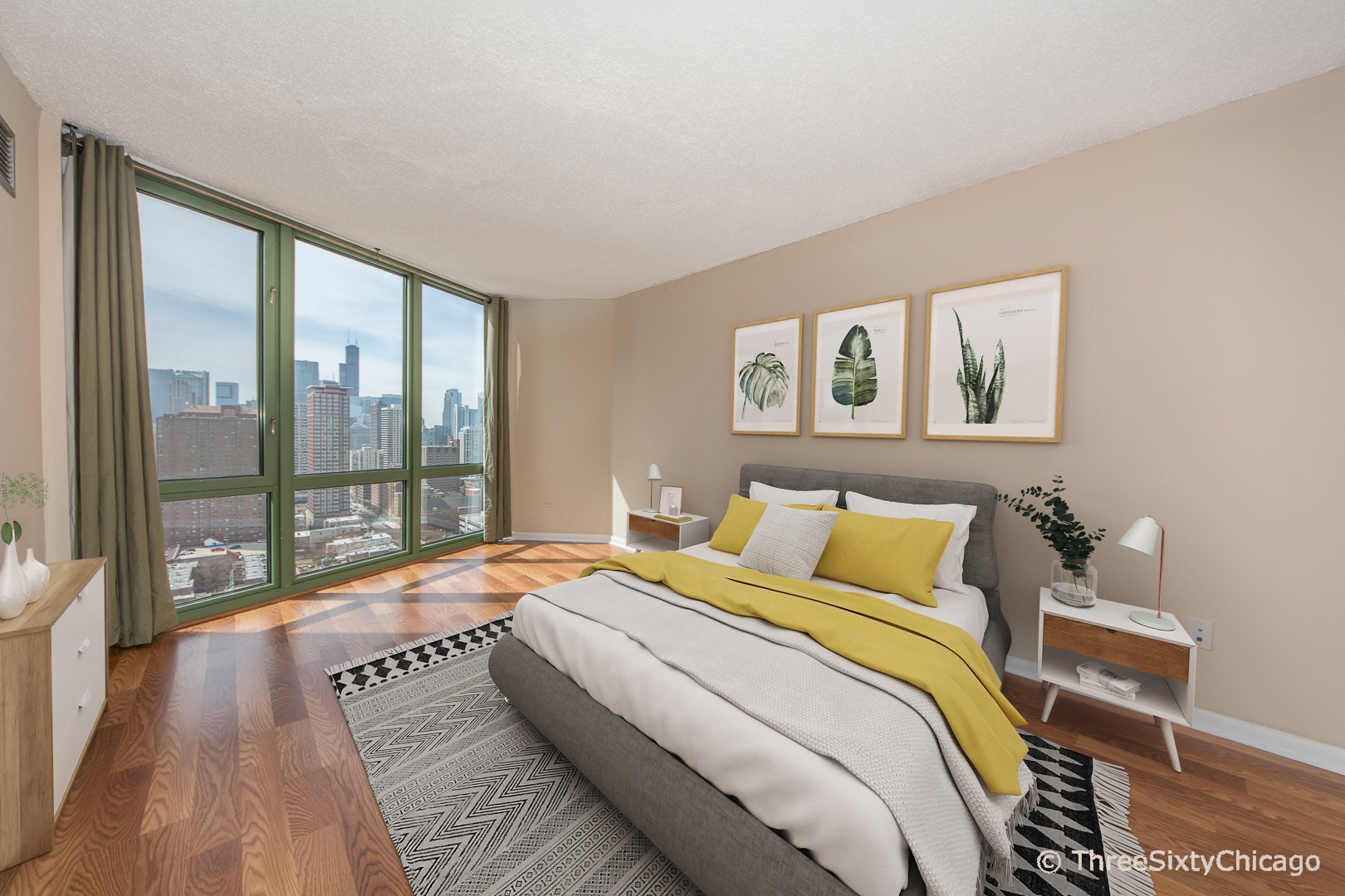 111 West Maple Street, Unit 2406 Chicago, IL 60610 - Photo 6 of 18 a bedroom with a large bed and a large window